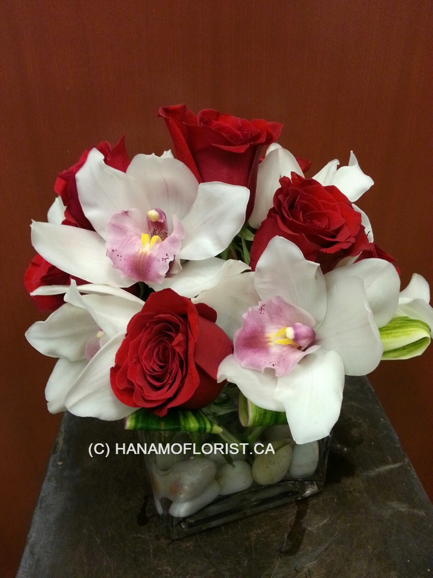 VALE109 Red Roses & Cymbidiums in 5 inch Glass Vase