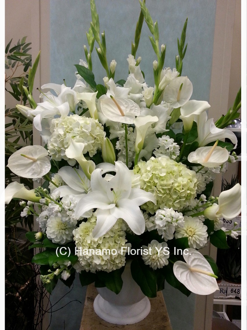 SYMP629 Most Elegant Arrangement with all white flowers